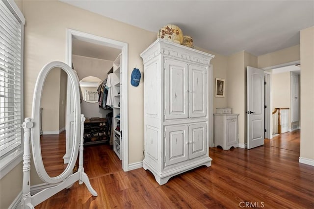 20072 Mural Cir, Huntington Beach, CA 92646 - corridor with wood finished floors and baseboards