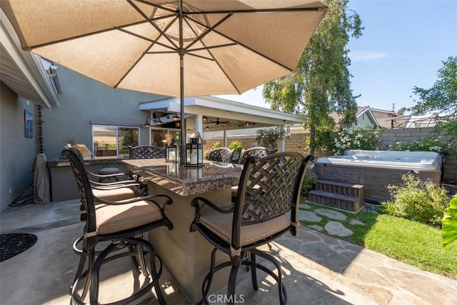 20072 Mural Cir, Huntington Beach, CA 92646 - view of patio with a hot tub and an outdoor bar