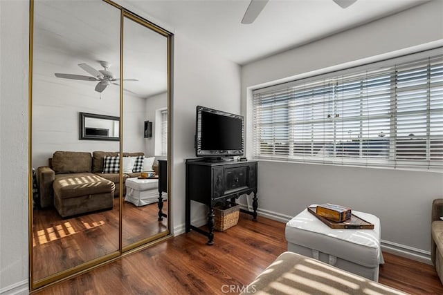 20072 Mural Cir, Huntington Beach, CA 92646 - living area featuring a ceiling fan and wood finished floors