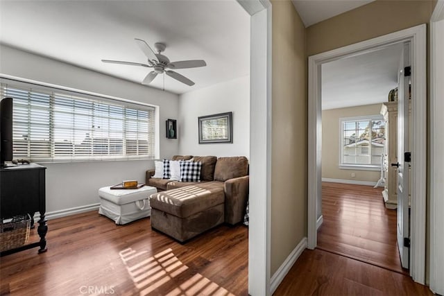 20072 Mural Cir, Huntington Beach, CA 92646 - home office featuring a ceiling fan and wood finished floors