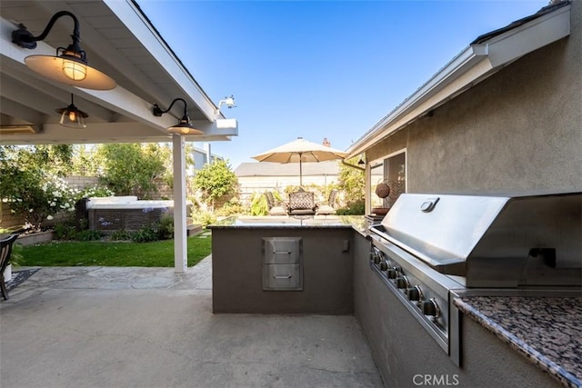 20072 Mural Cir, Huntington Beach, CA 92646 - view of patio with area for grilling and a hot tub