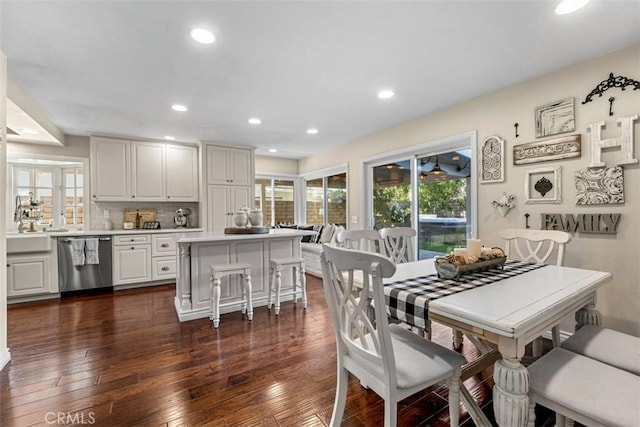 20072 Mural Cir, Huntington Beach, CA 92646 - dining area with dark wood-type flooring and recessed lighting