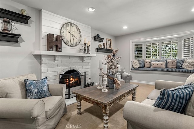 20072 Mural Cir, Huntington Beach, CA 92646 - living room featuring carpet flooring, recessed lighting, and a fireplace