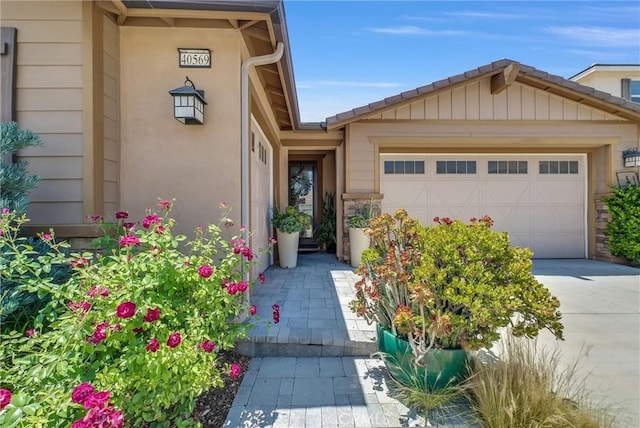 40569 Koa Ct, Temecula, CA 92591 - property entrance featuring a garage and concrete driveway