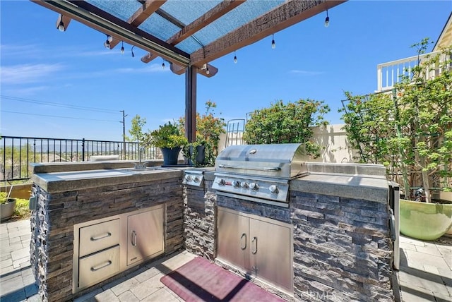 40569 Koa Ct, Temecula, CA 92591 - view of patio with exterior kitchen and a pergola