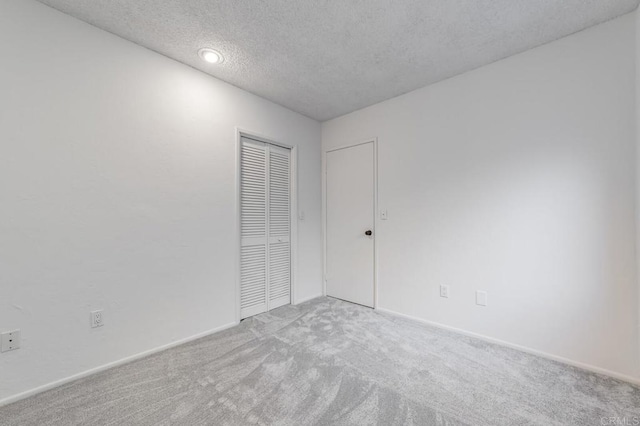 3526 Ticonderoga St, San Diego, CA 92117 - carpeted spare room with a textured ceiling and baseboards