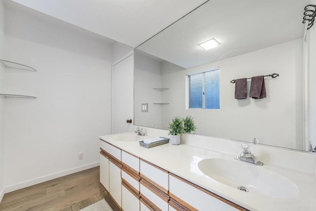 3526 Ticonderoga St, San Diego, CA 92117 - full bathroom featuring wood finished floors and double vanity