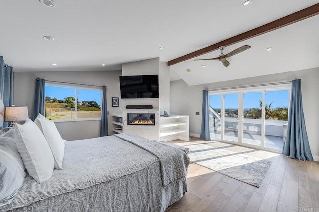 3526 Ticonderoga St, San Diego, CA 92117 - bedroom with access to outside, wood finished floors, a glass covered fireplace, ceiling fan, and recessed lighting