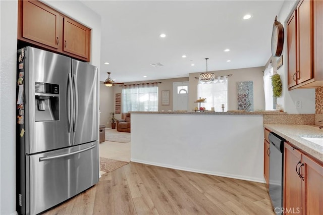 1405 Santa Victoria Rd Unit 2, Chula Vista, CA 91913 - kitchen with appliances with stainless steel finishes, light wood finished floors, open floor plan, a peninsula, and recessed lighting