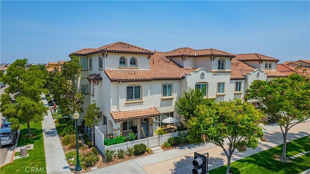 1405 Santa Victoria Rd Unit 2, Chula Vista, CA 91913 - view of front of house with a tiled roof and stucco siding