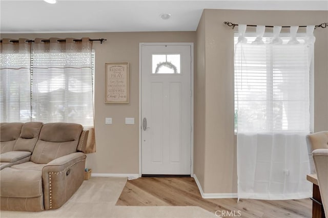 1405 Santa Victoria Rd Unit 2, Chula Vista, CA 91913 - entryway featuring light wood-style flooring and baseboards