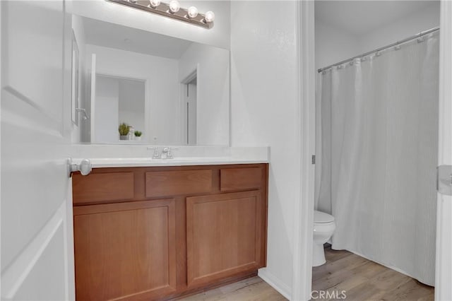 1405 Santa Victoria Rd Unit 2, Chula Vista, CA 91913 - bathroom featuring vanity, wood finished floors, and curtained shower