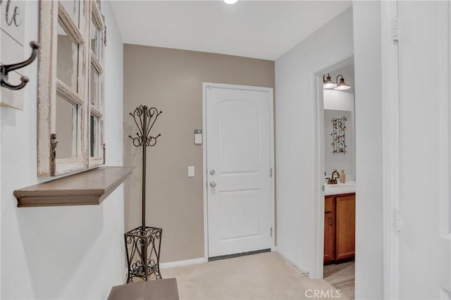1405 Santa Victoria Rd Unit 2, Chula Vista, CA 91913 - entryway featuring baseboards and light colored carpet