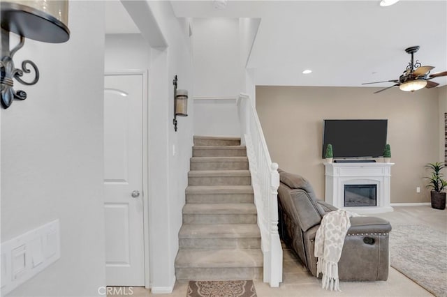 1405 Santa Victoria Rd Unit 2, Chula Vista, CA 91913 - stairway featuring a ceiling fan, recessed lighting, and a glass covered fireplace