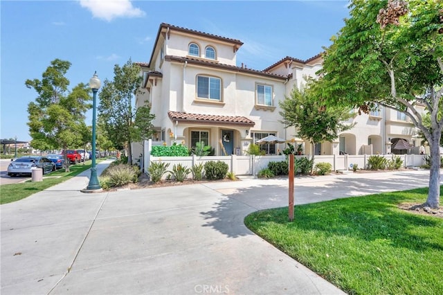 1405 Santa Victoria Rd Unit 2, Chula Vista, CA 91913 - mediterranean / spanish-style house with stucco siding and a tiled roof