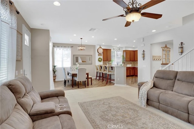 1405 Santa Victoria Rd Unit 2, Chula Vista, CA 91913 - living area featuring healthy amount of natural light, ceiling fan, stairs, and recessed lighting