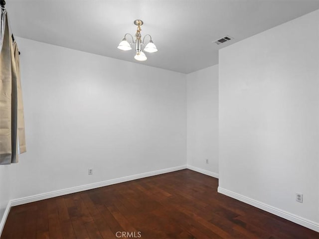 37453 56th St E, Palmdale, CA 93552 - empty room featuring a chandelier and wood finished floors