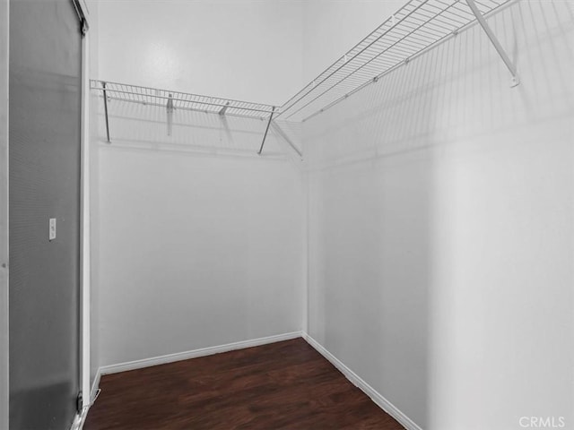 37453 56th St E, Palmdale, CA 93552 - walk in closet featuring wood finished floors