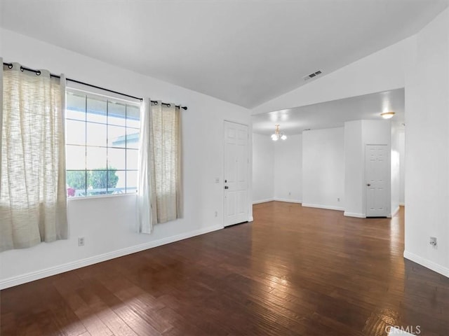 37453 56th St E, Palmdale, CA 93552 - spare room with vaulted ceiling, hardwood / wood-style flooring, and a chandelier