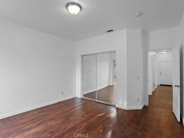 37453 56th St E, Palmdale, CA 93552 - unfurnished bedroom with a closet and wood finished floors