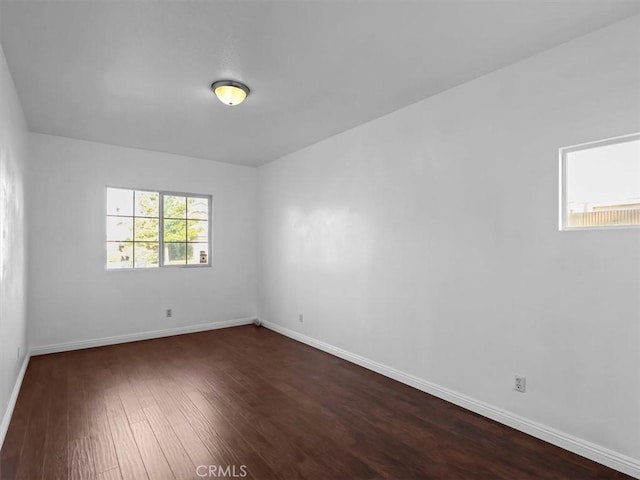 37453 56th St E, Palmdale, CA 93552 - empty room with dark wood-style flooring and baseboards