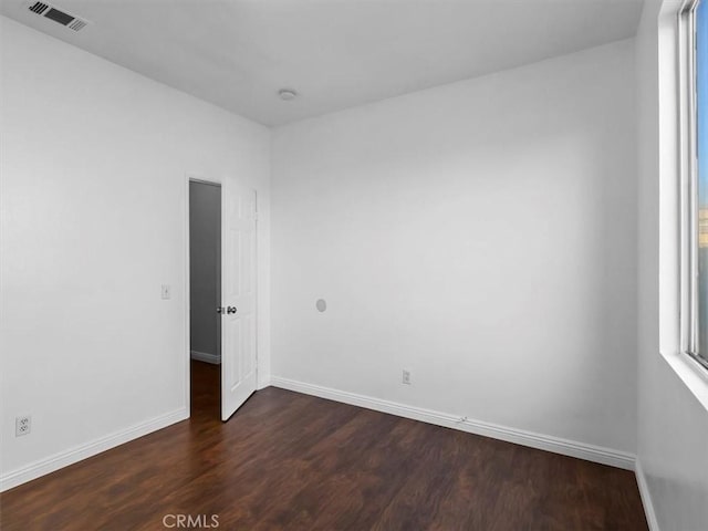 37453 56th St E, Palmdale, CA 93552 - empty room featuring dark wood-style flooring and baseboards