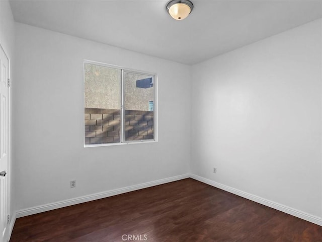 37453 56th St E, Palmdale, CA 93552 - empty room featuring wood finished floors and baseboards