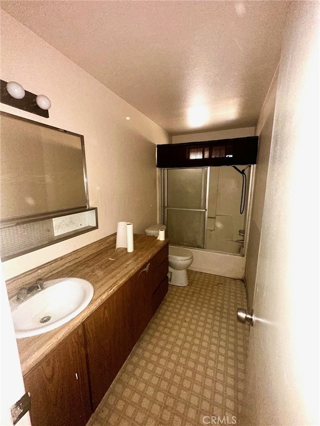 30001 Caddy Ln, Tehachapi, CA 93561 - full bathroom with vanity, a textured ceiling, enclosed tub / shower combo, and tile patterned floors