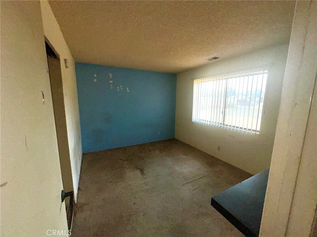 30001 Caddy Ln, Tehachapi, CA 93561 - unfurnished room with a textured ceiling