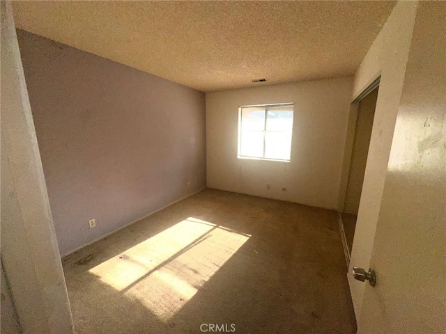 30001 Caddy Ln, Tehachapi, CA 93561 - spare room featuring a textured ceiling