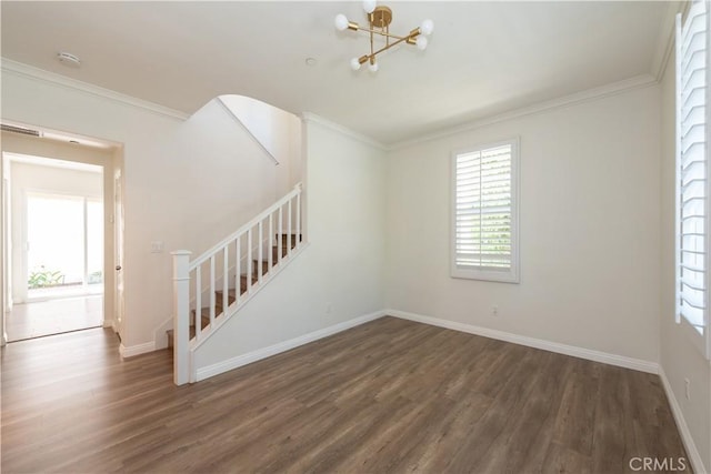 23 Bower Tree, Irvine, CA 92603 - unfurnished living room with wood finished floors, ornamental molding, a chandelier, and stairway