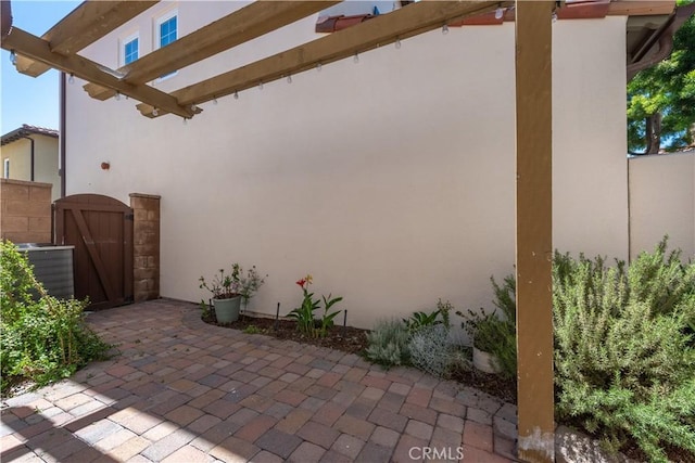 23 Bower Tree, Irvine, CA 92603 - view of patio / terrace featuring a gate