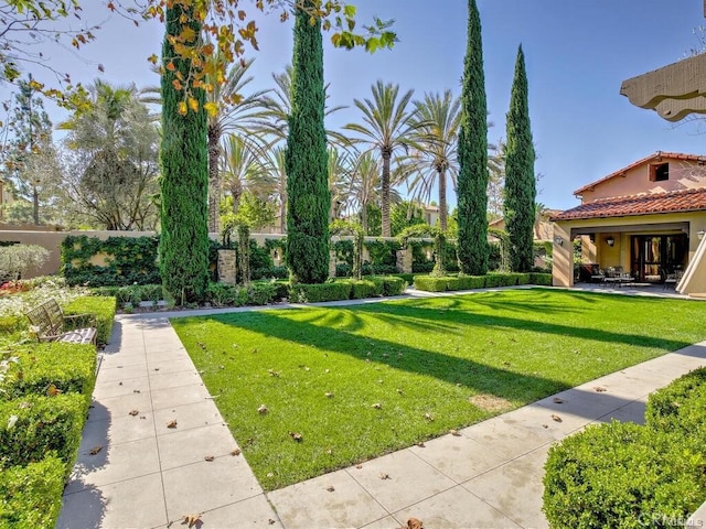 23 Bower Tree, Irvine, CA 92603 - view of yard featuring a patio area