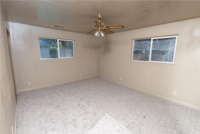 906 E 22nd St, Merced, CA 95340 - empty room featuring ceiling fan and carpet