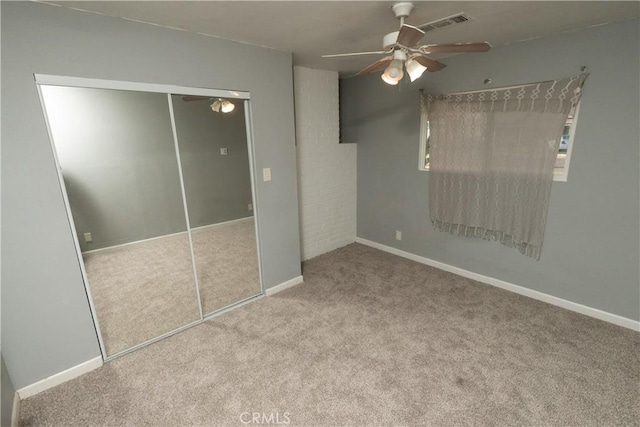 906 E 22nd St, Merced, CA 95340 - unfurnished bedroom featuring carpet, a closet, and a ceiling fan