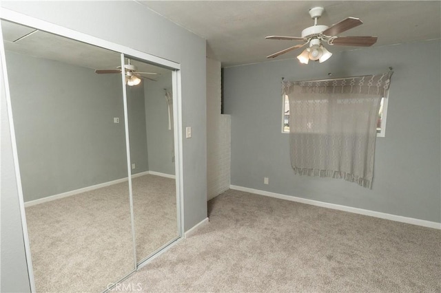906 E 22nd St, Merced, CA 95340 - unfurnished bedroom featuring carpet floors, a closet, and a ceiling fan