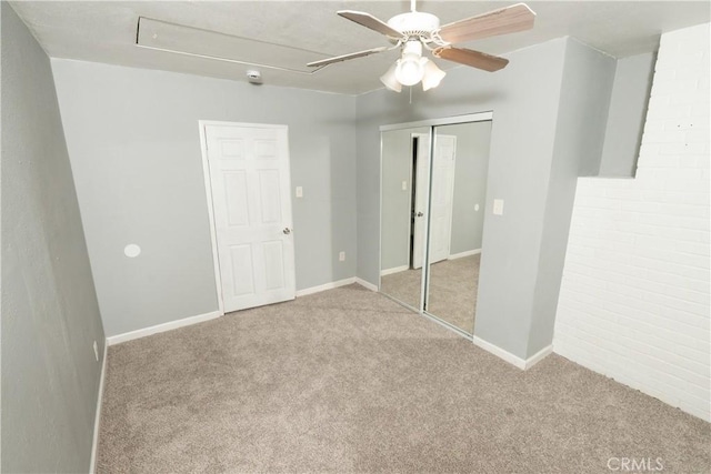906 E 22nd St, Merced, CA 95340 - unfurnished bedroom with attic access, carpet floors, a closet, and a ceiling fan