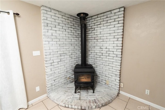 906 E 22nd St, Merced, CA 95340 - detailed view of a wood stove and baseboards