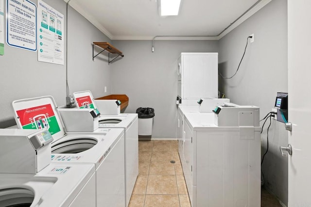 1021 Scott St Unit 130, Point Loma, CA 92106 - shared laundry with independent washer and dryer, crown molding, and light tile patterned flooring