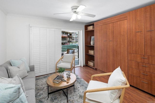 1021 Scott St Unit 130, Point Loma, CA 92106 - living area featuring wood finished floors, ornamental molding, and a ceiling fan