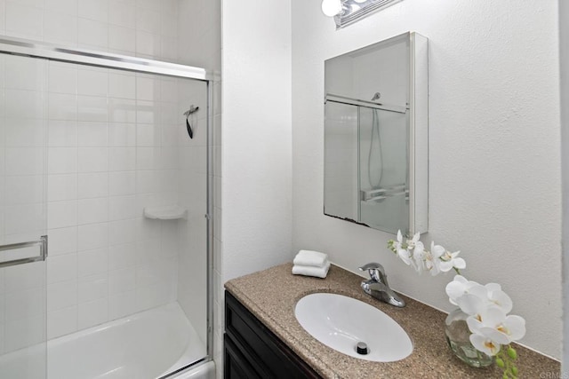 1021 Scott St Unit 130, Point Loma, CA 92106 - bathroom featuring vanity and combined bath / shower with glass door
