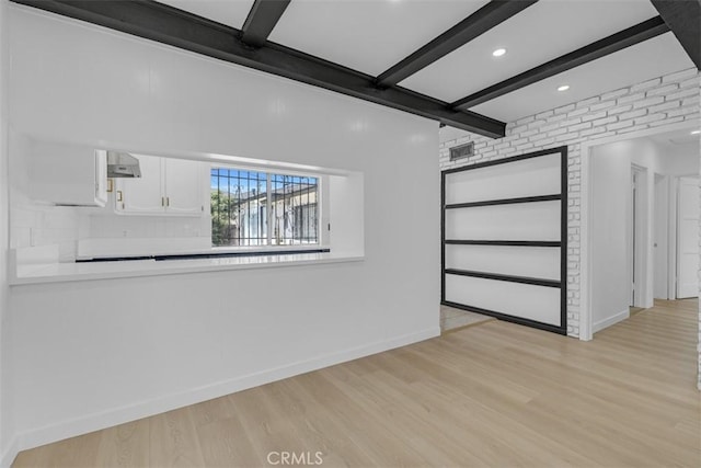 501 W Floral Dr, Monterey Park, CA 91754 - unfurnished living room with light wood-style floors, beam ceiling, and recessed lighting