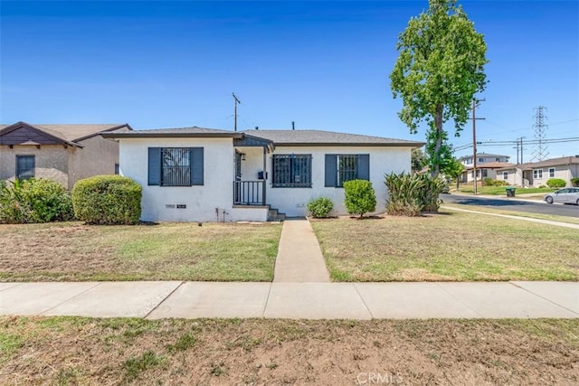 501 W Floral Dr, Monterey Park, CA 91754 - bungalow featuring a front yard and stucco siding