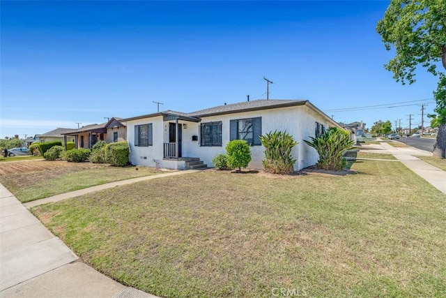 501 W Floral Dr, Monterey Park, CA 91754 - view of front of home featuring stucco siding and a front yard