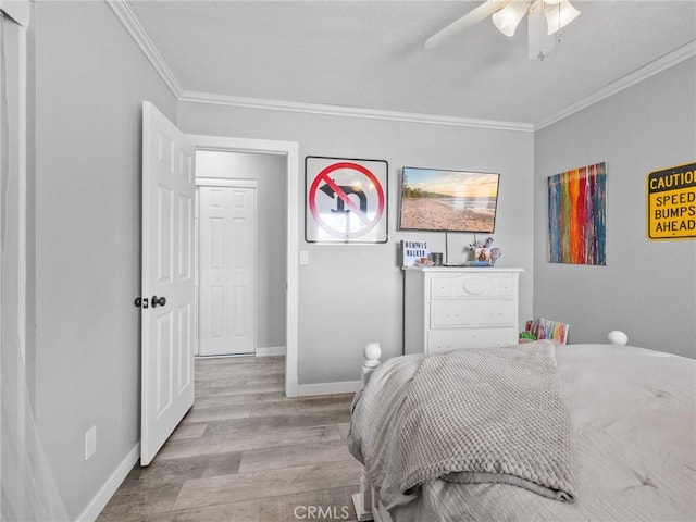 1233 Cabrillo Dr, Barstow, CA 92311 - bedroom featuring crown molding, wood finished floors, and ceiling fan