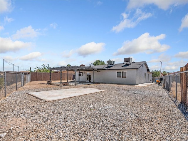 1233 Cabrillo Dr, Barstow, CA 92311 - back of house with a pergola, a fenced backyard, and a patio