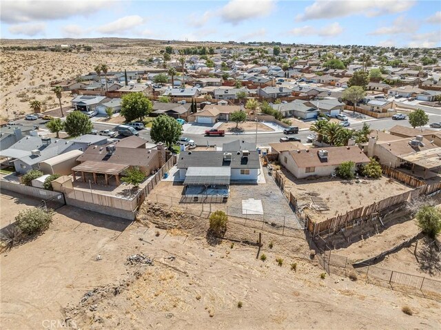 1233 Cabrillo Dr, Barstow, CA 92311 - aerial perspective of suburban area with a desert landscape