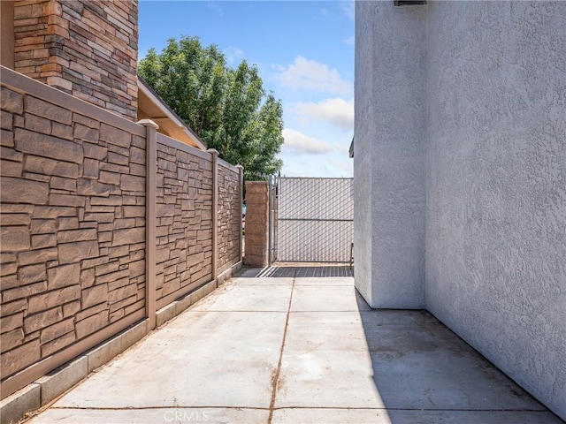 1233 Cabrillo Dr, Barstow, CA 92311 - view of patio / terrace featuring a gate