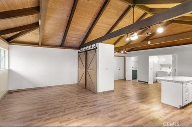 292 Heliotrope Dr, Lake Arrowhead, CA 92352 - unfurnished living room featuring wooden ceiling, light wood finished floors, and a barn door
