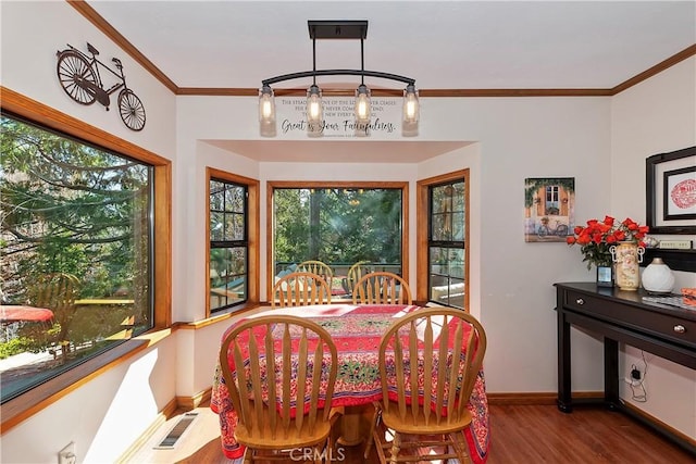 292 Heliotrope Dr, Lake Arrowhead, CA 92352 - dining area with wood finished floors, ornamental molding, and plenty of natural light